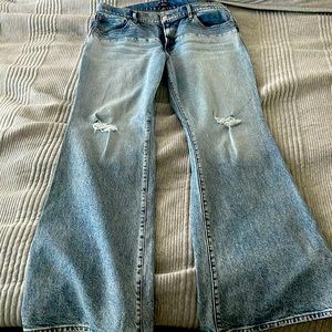 Express Mid Rise Medium Wash Two-Toned Ripped 70’ Flare Jeans. Size 14.